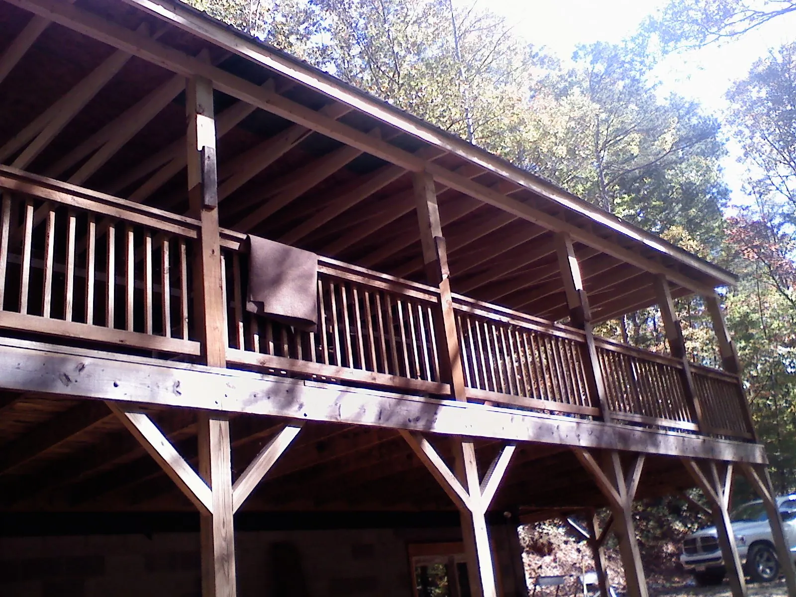Timber framing under a new elevated porch and deck — Roof Leak Repair in Tahoma by Roofing Brothers